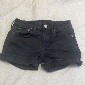 AMERICAN EAGLE next level stretch black jean shorts rolled up. Size 00 (teens)